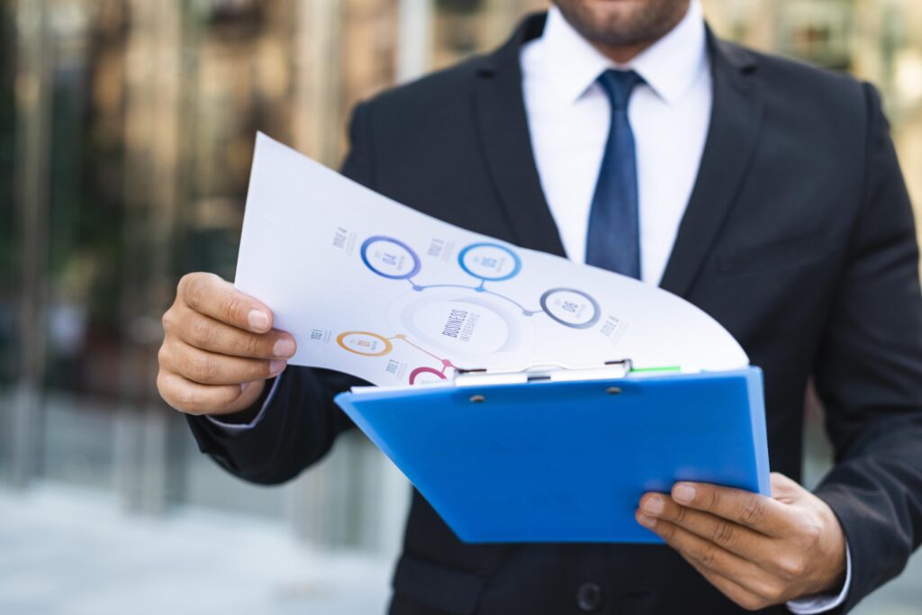 front view business man looking charts